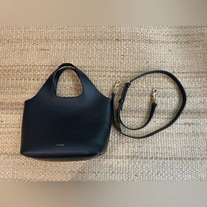Cuyana Mini System Tote black pebbled leather with crossbody strap